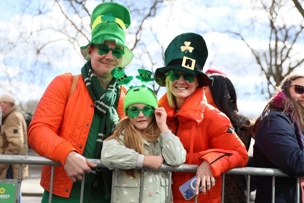 Spectators take part in London's St. Patrick's Day Festival this week. The celebrations worldwide provide a rallying point for those of Irish heritage (Photo by Alishia Abodunde/Getty Images)