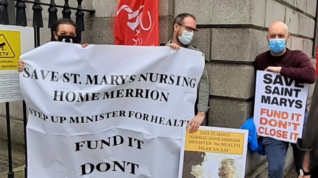 Campaigners against the closure of St Mary’s nursing home and disability centre protest outside the Four Courts on Tuesday. Photograph:  Aodhan O Faolain