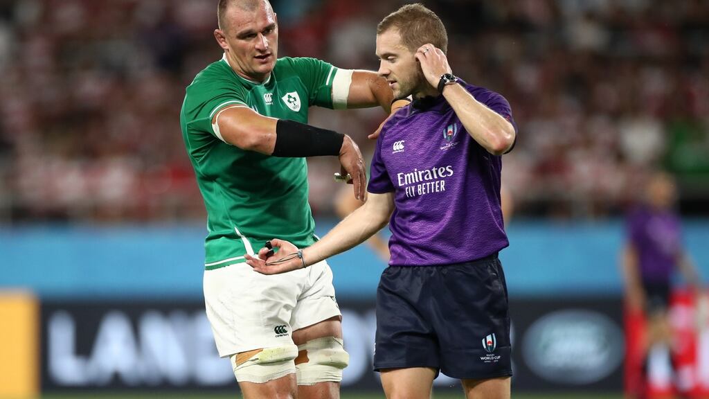 Rhys Ruddock of Ireland talks to referee Angus Gardner during the Rugby World Cup 2019 Pool A match against Japan. Photo: Cameron Spencer/Getty Images