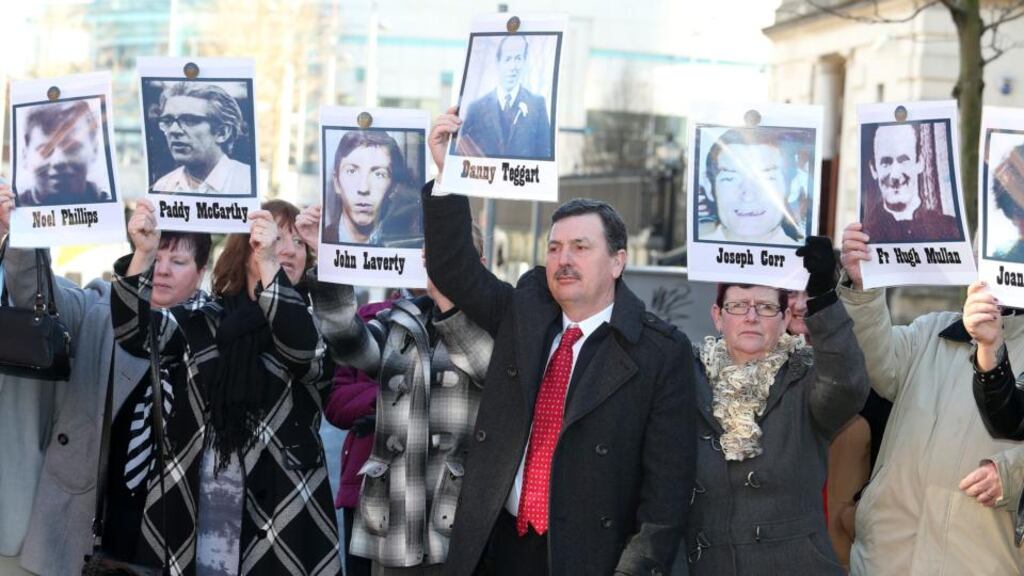 Supporters of the victims outside Belfast Coroner’s Court at the start of a new inquest into the deaths of 10 people shot dead by British soldiers in west Belfast in 1971. Photograph: PA
