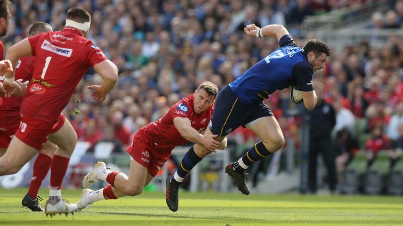 Leinster’s Robbie Henshaw breaks clear during the Champions Cup semi-final against Scarlets at the Aviva Stadium. Photograph: David Rogers/Getty Images