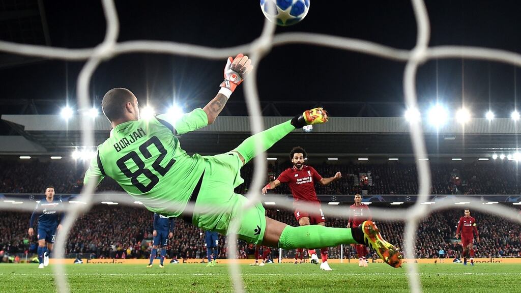 Liverpool’s Mohamed Salah scores his second of the game from the penalty spot in the Champions League Group C match against Red Star Belgrade at Anfield. Photograph: Michael Regan/Getty Images