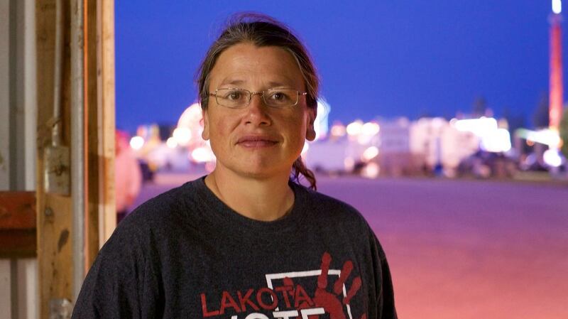 Native American community activist Chas Jewett: “The genocide has never stopped.”