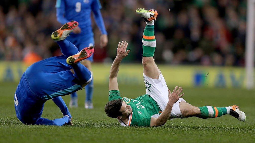 Republic of Ireland’s Wes Hoolahan collides with  Peter Pekarik of Slovakia during the friendly international at the Aviva Stadium. Photograph: Donall Farmer/Inpho