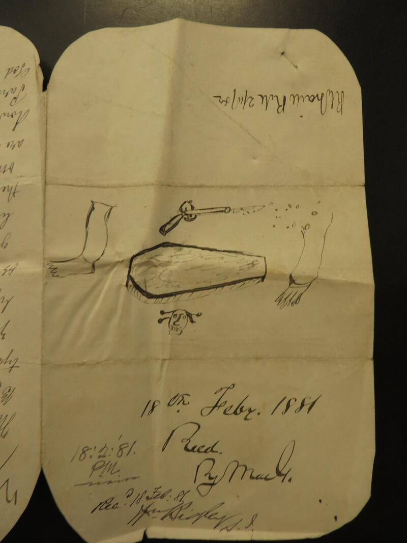 A rare example in a threatening letter of two severed limbs, an equally rare three-dimensional coffin, an antiquated flintlock being discharged and an unusual skull and cross bones. (Courtesy of the National Archives of Ireland: CSO Letter book, 15, February 1881)