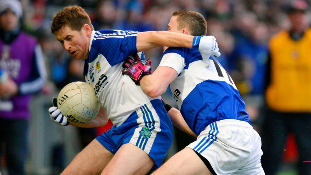 Ballinderry’s Darren Lawn challenges St Vincent’s Conleth Gilligan in Newry. Photograph: Russell Pritchard/Inpho