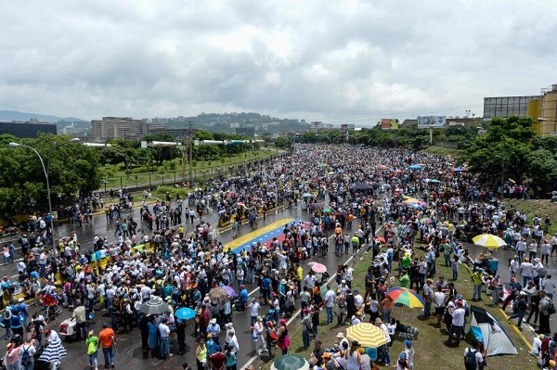 Caracas: Demonstrators have been on the streets every day since early April to demand elections. Photograph: Federico Parra/AFP/Getty