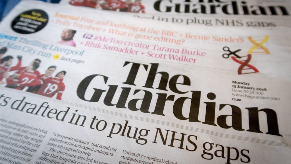 In a cost-cutting move, the Guardian Media Group has ditched the distinctive Berliner size after just over 12 years and gone tabloid. Photograph: Matt Cardy/Getty Images