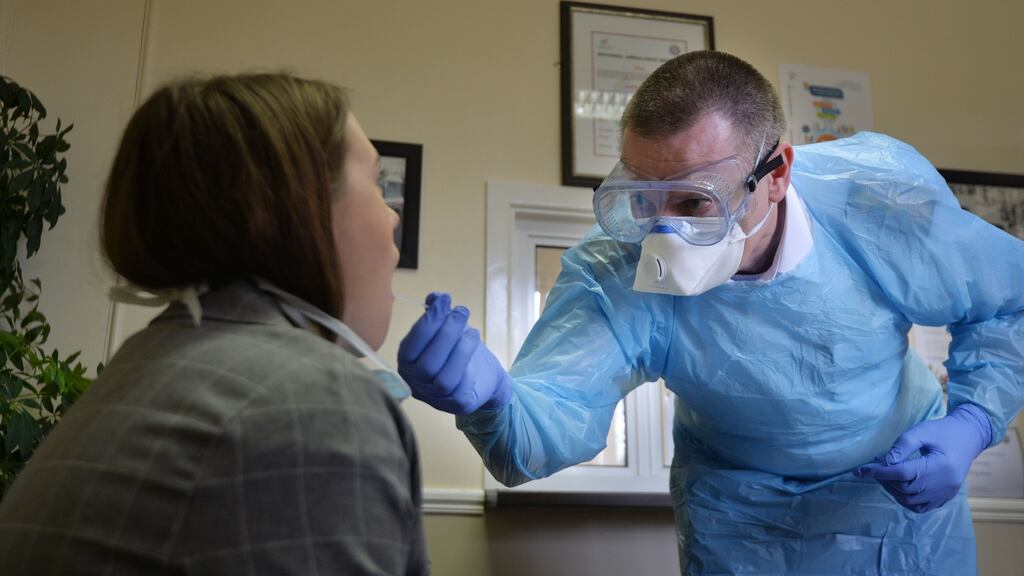 The current standard invasive test for coronavirus collects specimens from the back of the nose and throat. Photograph: Alan Betson