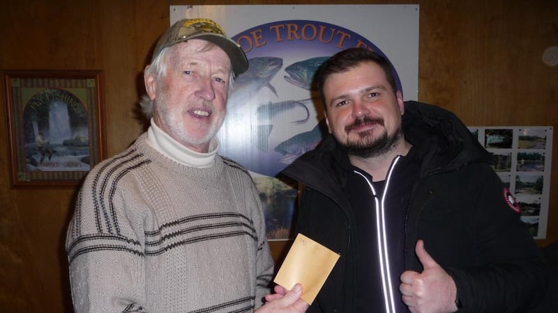 Robert Bujak (right) from Greystones, receiving his Southside Angling Centre voucher from Annamoe Trout Fishery proprietor Brian Nally, following his win in the winter league final