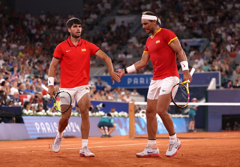 Rafael Nadal and Carlos Alcaraz during their men's doubles quarter-final against Team USA's Austin Krajicek and Rajeev Ram . (Photograph: Julian Finney/Getty