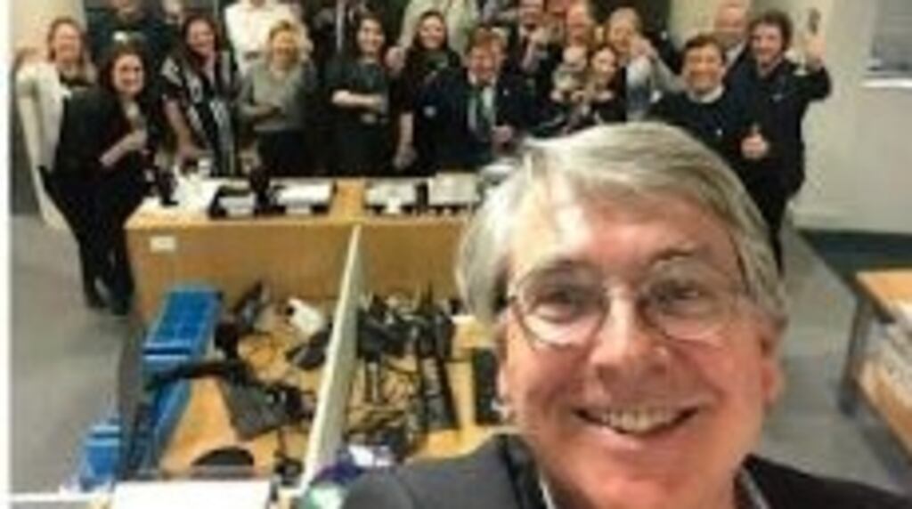 A photograph of the celebration at a time of Covid-19 restrictions on gatherings was posted on Twitter by then secretary general of the department Niall Burgess