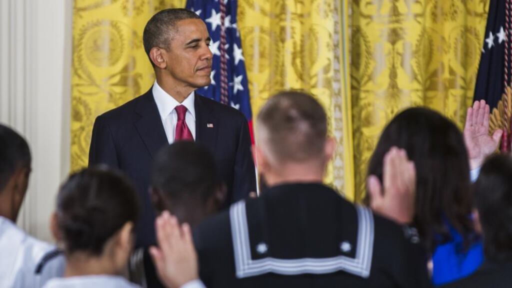 US president Barack Obama presides over a naturalisation ceremony for active duty service members and civilians in the East Room of the White House yesterday. Photograph: Getty Images
