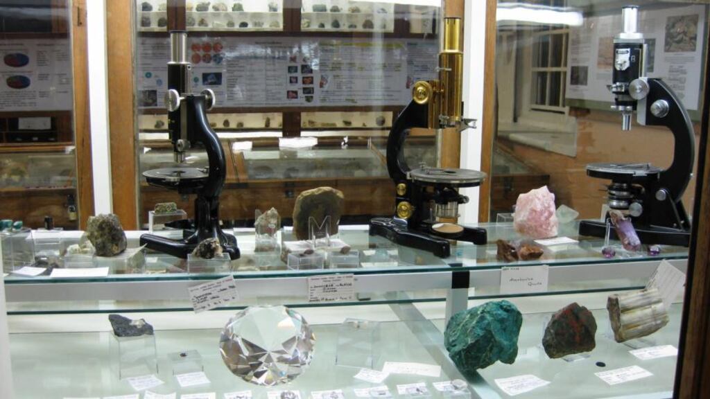 Rescued and restored microscopes,   among the many mineral samples in the “hidden museum”, now refurbished and due to reopen to the public in the Quadrangle of NUI Galway next month. Photograph: NUIG Earth and Ocean Sciences