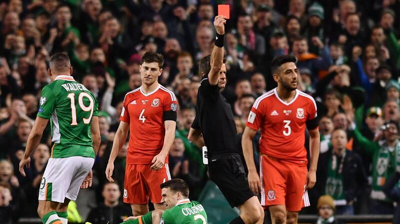 Coleman reacts as Neil Taylor is sent off for the tackle which broke the Irishman’s leg. Photo: Ramsey Cardy/Sportsfile via Getty Images