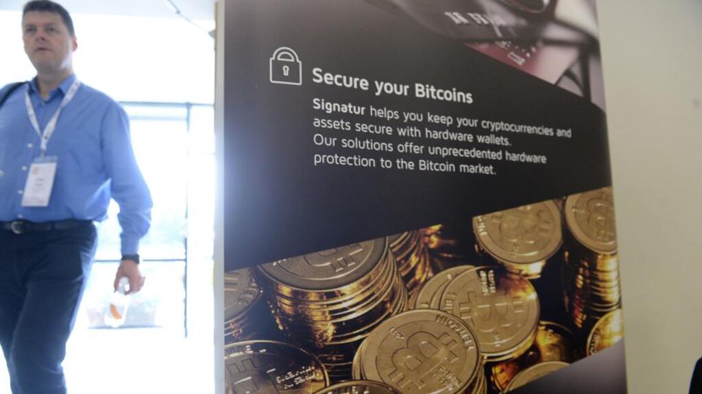 A poster on display at the Bitcoin Finance conference which is taking place in Dublin today. European Union banks should shun virtual currencies such as bitcoin until a system of rules to prevent abuses are put in place, the European Banking Authority has said. Photo: Cyril Byrne/The Irish Times