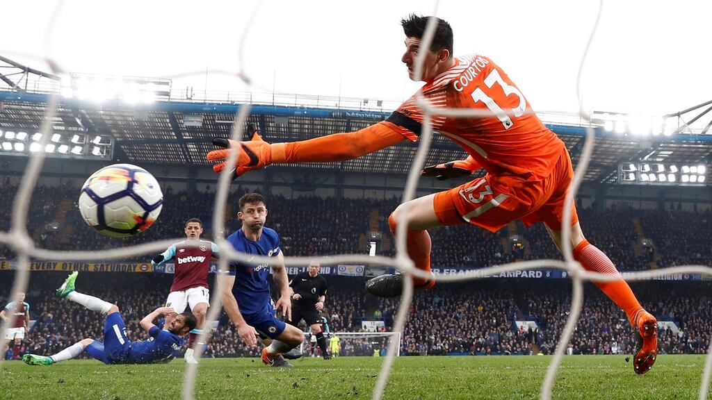 Javier Hernandez scores West Ham’s equaliser at Stamford Bridge. Photograph: Eddie Keogh/Reuters