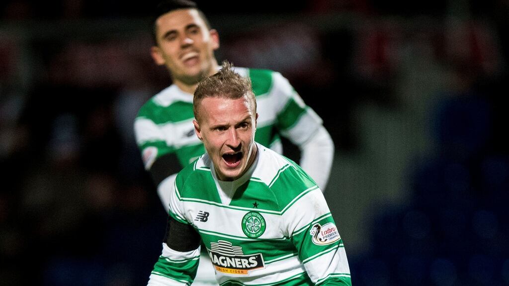 Leigh Griffiths celebrates scoring Celtic’s third goal at Dingwall yesterday. Photograph: Craig Watson/PA