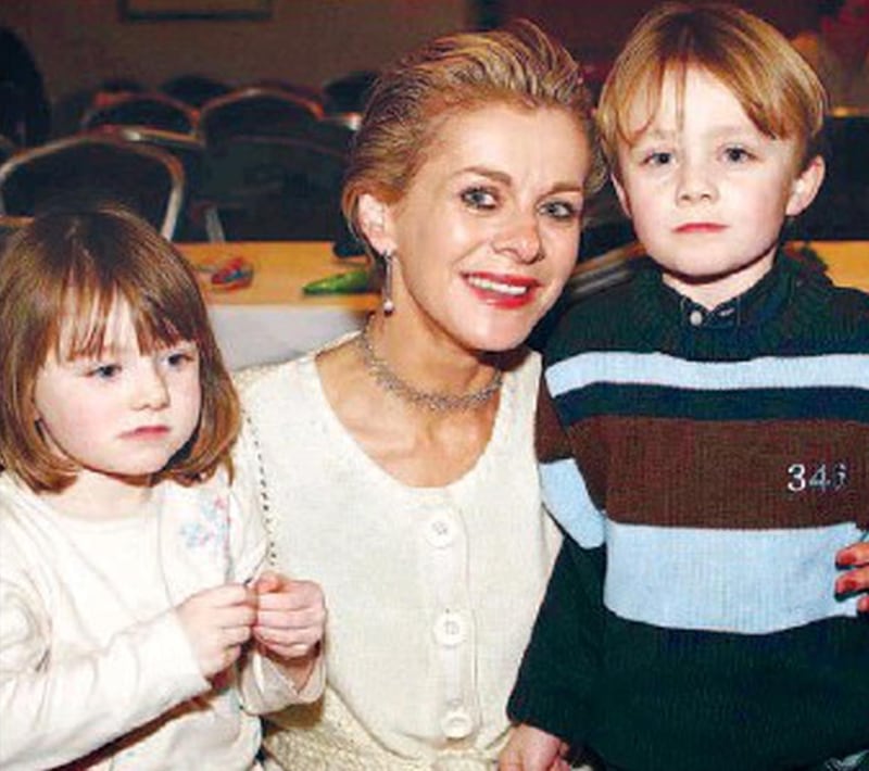 Lorraine Flood with her children, Julie and Mark
