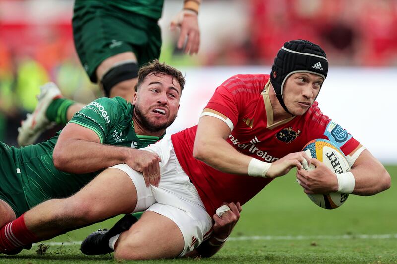 Munster's Mike Haley scores a try despite the efforts of Connacht's Shayne Bolton at Thomond Park. Photograph: Laszlo Geczo/Inpho