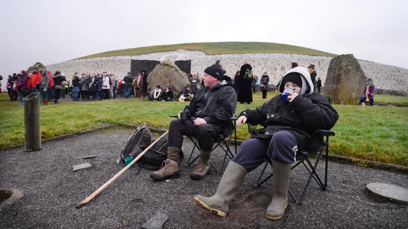 People gather at Newgrange for the dawn sunrise of the winter solstice. Photograph: Alan Betson