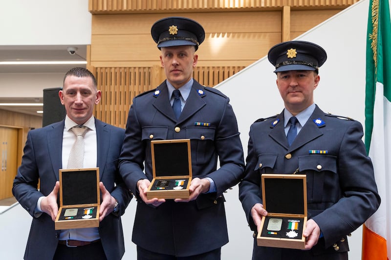Det Garda Niall Minnock, Garda Conor Garland and Sgt Andrew O'Connor were awarded silver Scott medals. Photograph: Colin Keegan/Collins Dublin