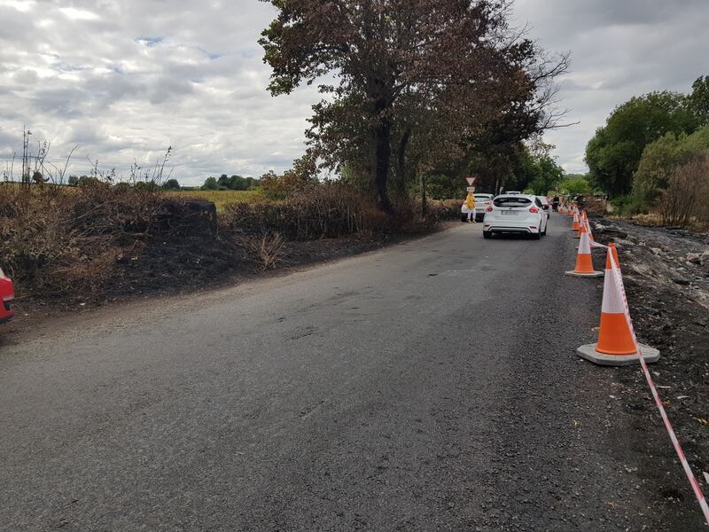 The adjoining road surface and concrete plinth for the walk were also damaged in the blaze. Photograph: Paddy Logue