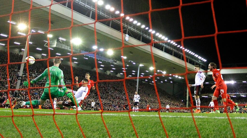 Liverpool’s Roberto Firmino scores his sides second goal of the game at Anfield. Photograph: Peter Byrne/PA Wire