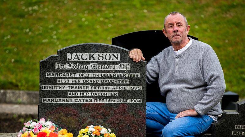 Dessie Trainor, a Catholic who lives on the Garvaghy Road in Portadown, in July at the grave of his mother, a Protestant who was killed in a sectarian gun attack by loyalists in April 1975. One of Trainor’s brothers was killed in a bomb attack on their house, also in 1975, and a second brother was killed in a gun attack by loyalists in 1978. Photograph: Liam McBurney