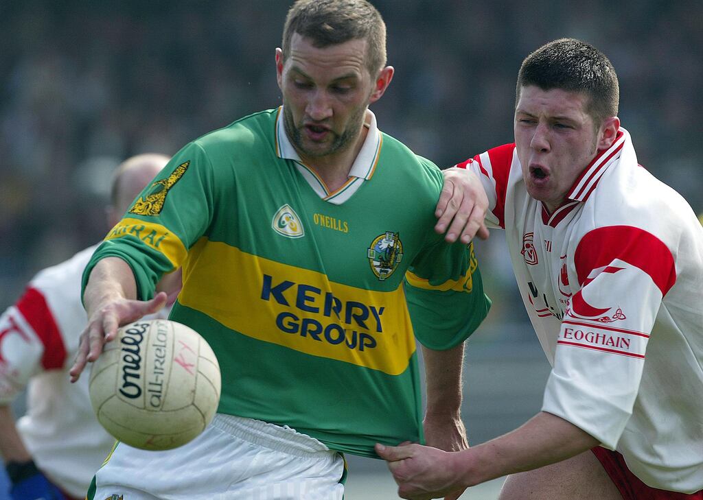 Donal Daly of Kerry and Tyrone's Sean Cavanagh in action during the league clash in Killarney in 2003. Cavanagh's outstanding mobile display that day in Tyrone's victory was a sign of what was to come from the young midfielder. Photograph: Lorraine O'Sullivan/Inpho