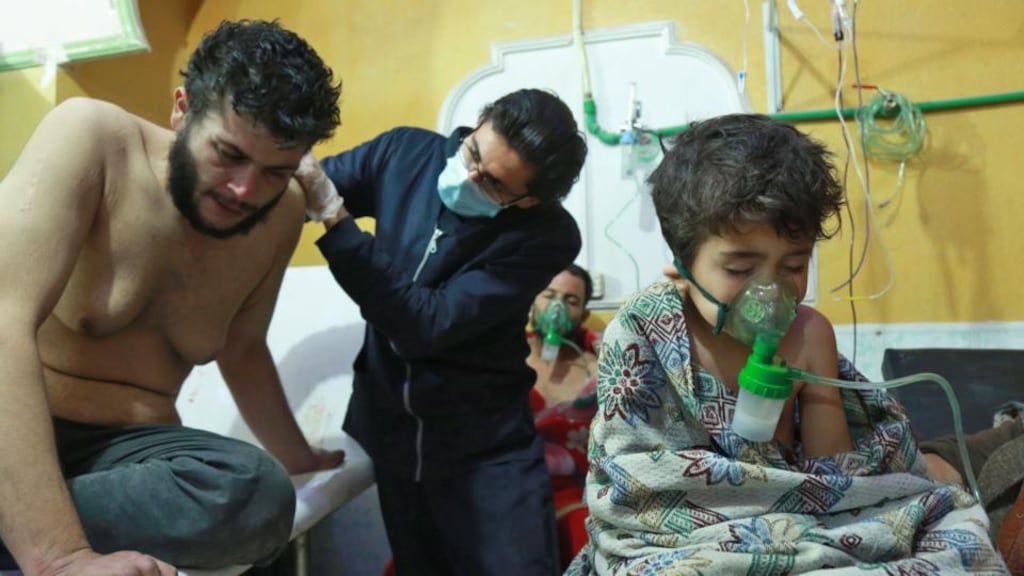 Syrian children and adults receive treatment for a suspected chemical attack at a makeshift clinic on the rebel-held village of al-Shifuniyah in the eastern Ghouta region near Damascus on Sunday. Photograph: Hamza Al-Ajweh/AFP/Getty Images