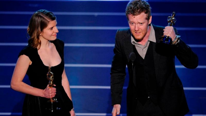 Glen Hansard and Marketa Irglova accept the Oscar for best original song for "Falling Slowly" from the motion picture "Once" at the 80th Academy Awards Sunday, Feb. 24, 2008, in Los Angeles. (AP Photo/Mark J. Terrill)
