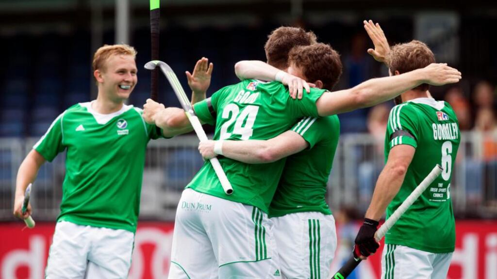 Ireland celebrate after John Jackson scores his side’s equaliser in their 2-2 World League Round Three draw with Great Britain. Photograph: Inpho