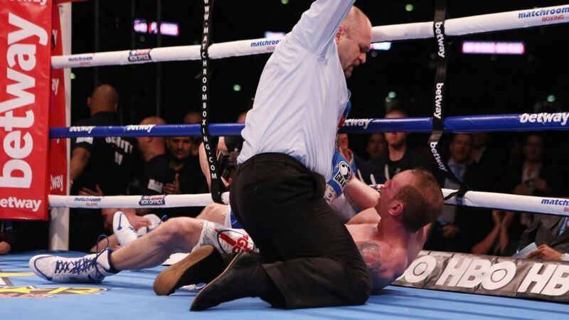 George Groves is counted out by the referee after being knocked down by Carl Froch at Wembley Stadium. Photograph: Peter Byrne/PA Wire