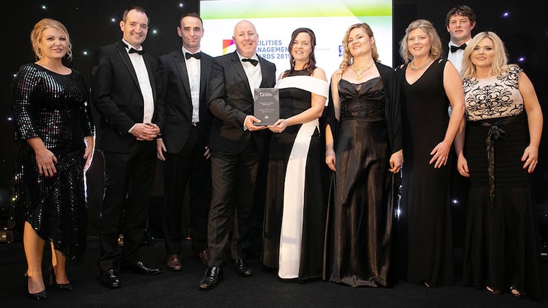 Leslie Sheridan, Managing Director, Mitie Facilities Management presents the FM Project of the Year – Public Sector award to the BAM FM Ireland Team.