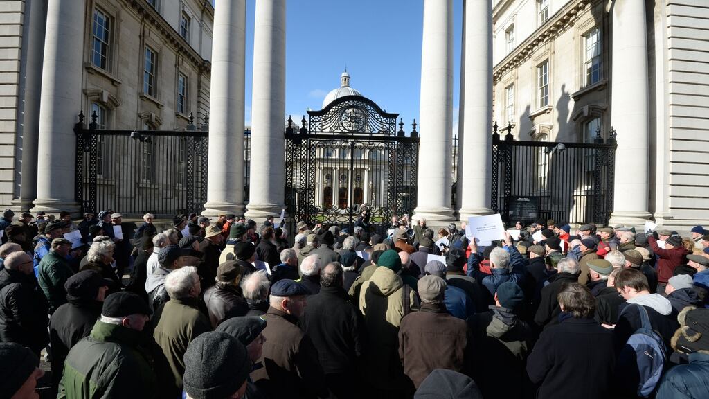 Pensioners protest outside Government Buildings last year. By 2055, just two people are estimated will be working for every person in retirement, compared to about five today. Photograph: Dara Mac Dónaill/The Irish Times