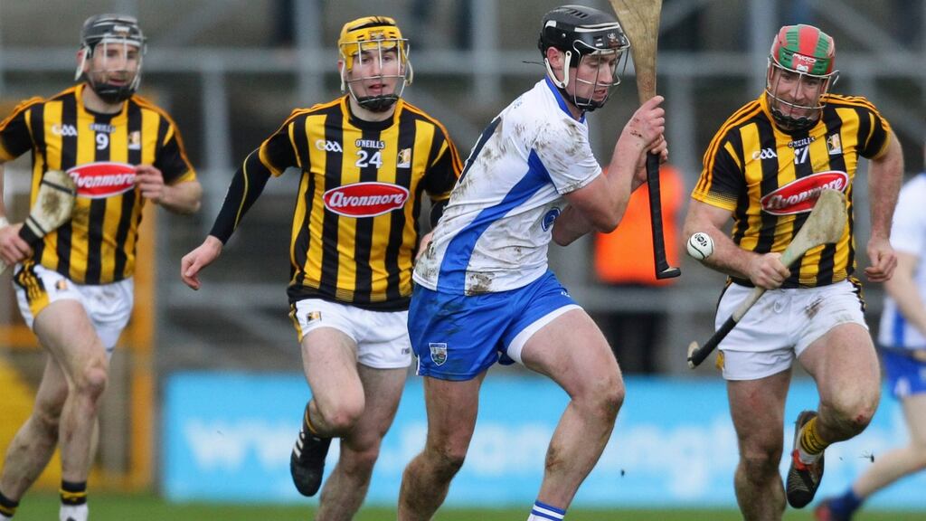 Waterford’s Pauric Mahony keeps one step ahead of Kilkenny challengers. Photograph: Ken Sutton/Inpho