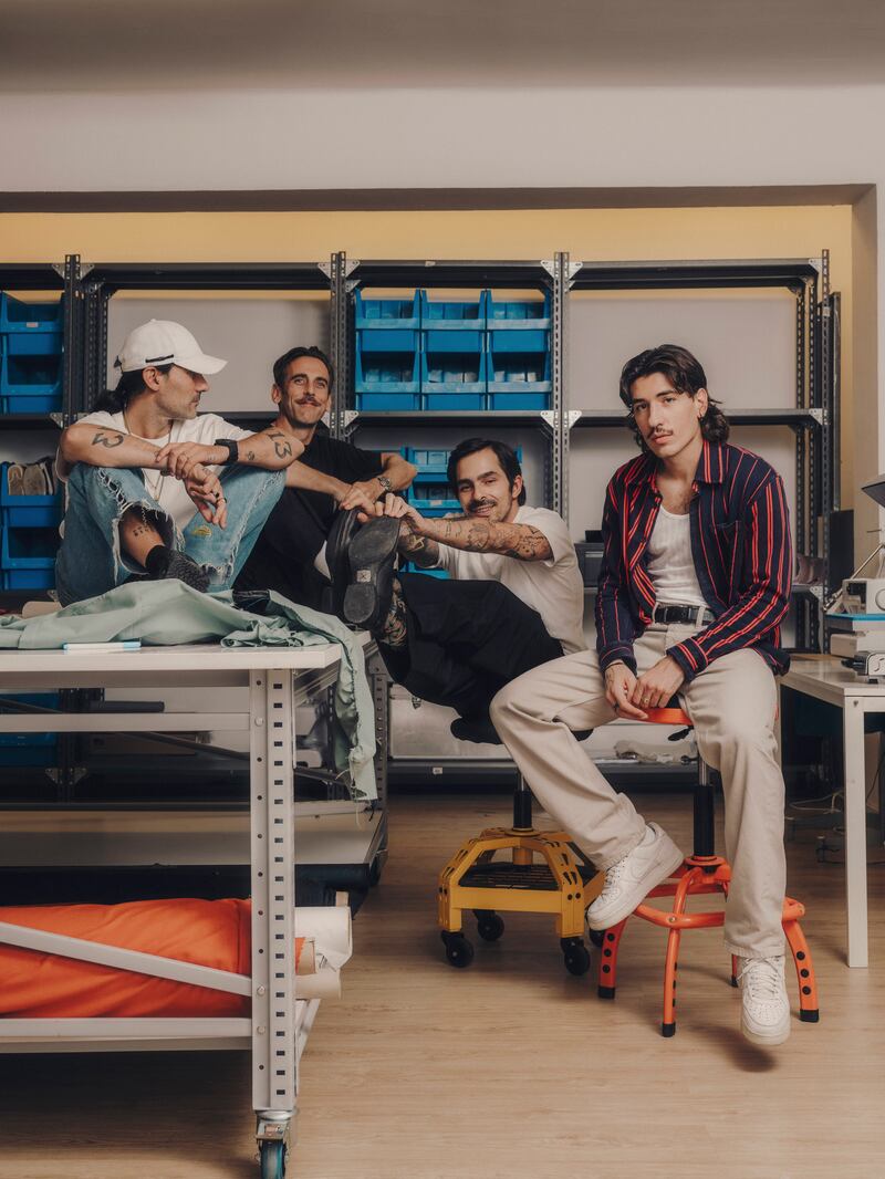 Héctor Bellerín (right), with designers for his brand, from left: Israel Frutos and Quim Barriach, and business partner Horacio González-Alemán, in Barcelona. Photograph: Salva López/The New York Times