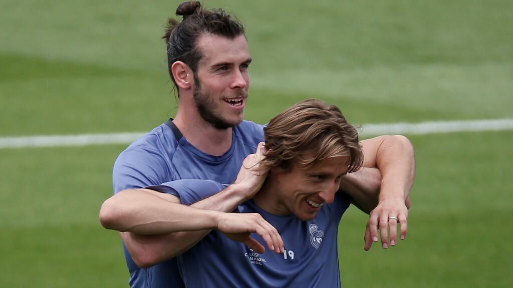 Real Madrid’s Gareth Bale and Luka Modric joke around during a training session ahead of the Champions League final. Photo: Sergio Perez/Reuters