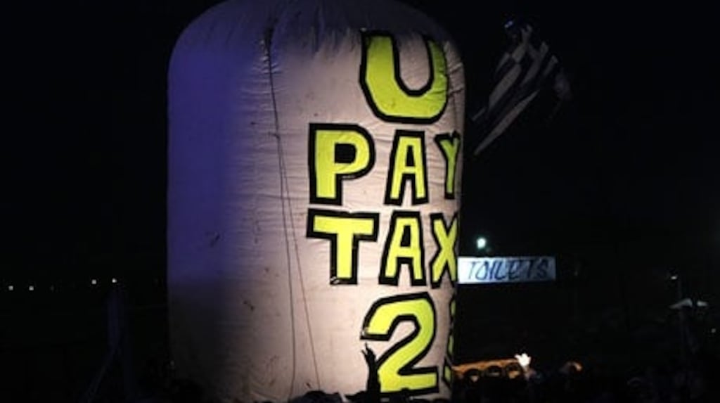 A balloon erected in front of the stage at Glastonbury where U2 were playing in 2011.