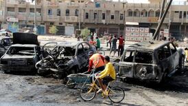 Spike in Iraq violence continues as co-ordinated bombings  kill 62