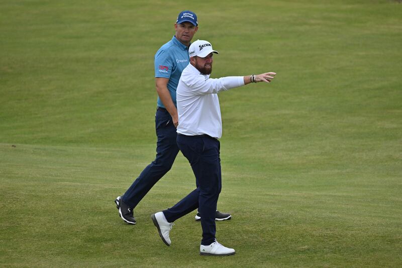 Ireland's Padraig Harrington (left) walks the course with Ireland's Shane Lowry. Photograph: Glyn Kirk/AFP via Getty