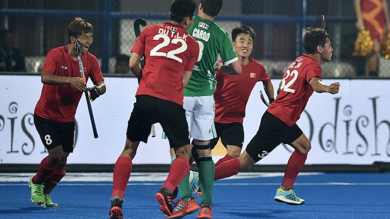 China celebrate Guo Jin’s opener against Ireland. Photograph: Charles McQuillan/Getty