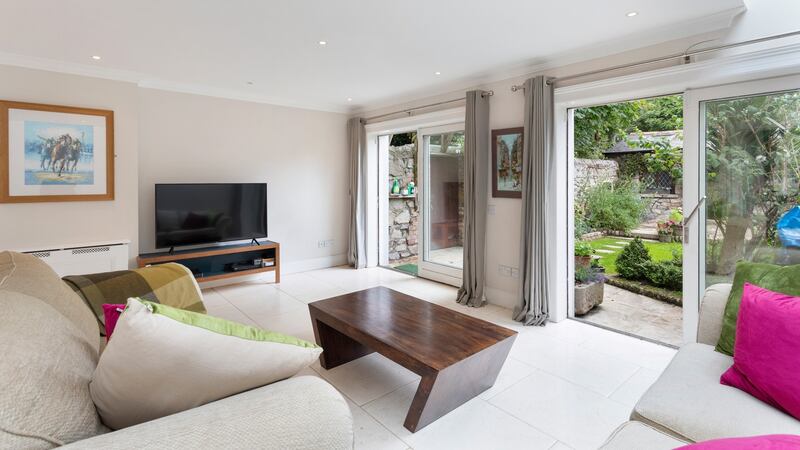 Rear reception opens out to garden