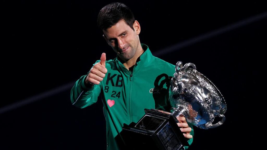 Novak Djokovic celebrates his Australian Open win. Photograph: Graham Denholm/Getty