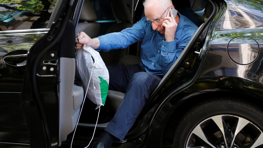 Former president of the Olympic Council of Ireland Pat Hickey arrives at a residential building after leaving the Bangu Jails Complex in Rio de Janeiro, Brazil. Photograph: Ricardo Moraes/Reuters