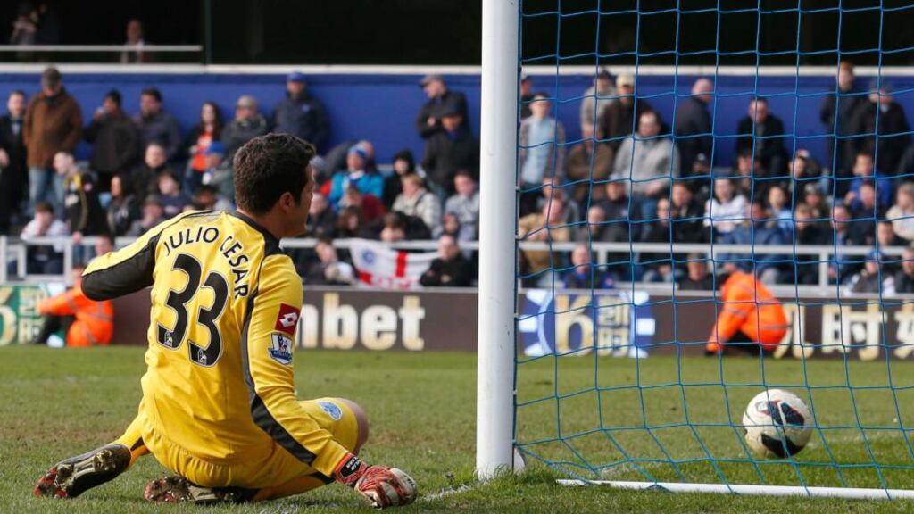 QPR goalkeeper Julio Cesar reacts after he was beaten by a late free-kick from Wigan’s Shaun Maloney at Loftus Road. Photograph: Suzanne Plunkett/Reuters