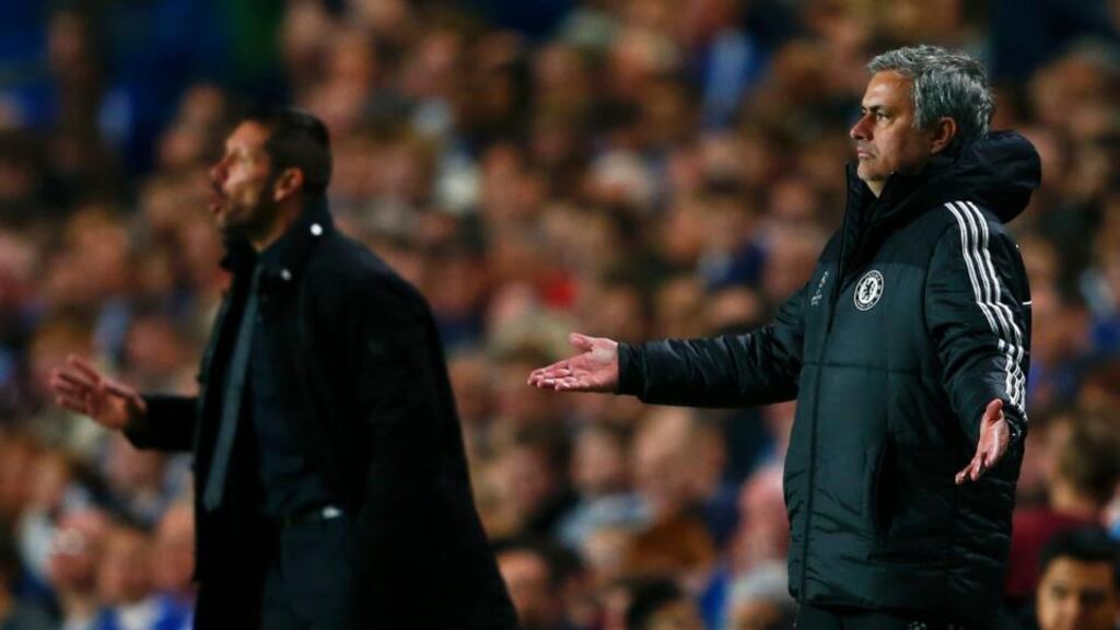 Chelsea manager Jose Mourinho reacts alongside Atletico Madrid coach Diego Simeone during the Champions League semi-final second leg at Stamford Bridge. Photograph: Eddie Keogh/Reuters.