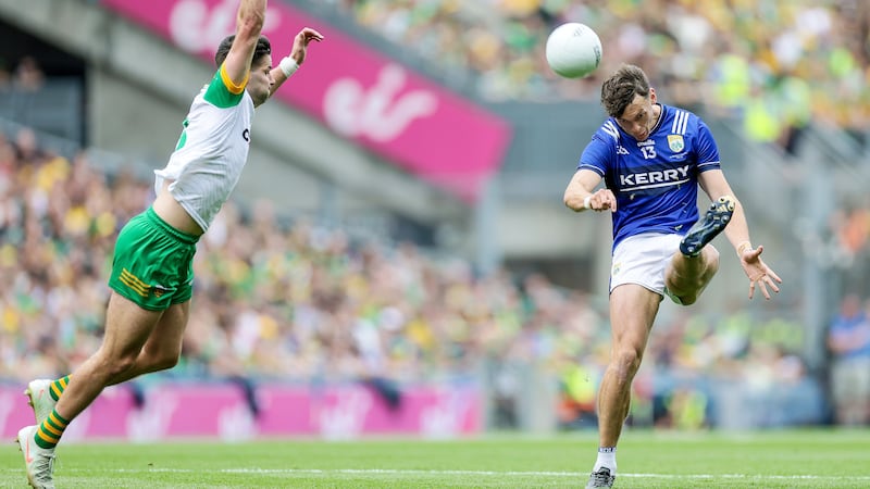 Kerry's David Clifford scores two points despite Brendan McCole of Donegal. Photograph: Laszlo Geczo/Inpho