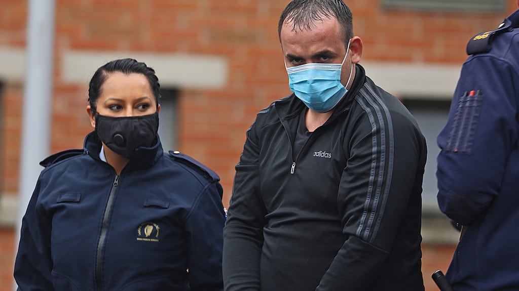 Lance Dempsey is escorted from Cavan Courthouse following his sentencing for the attack on his pregnant girlfriend. Photograph: Lorraine Teevan